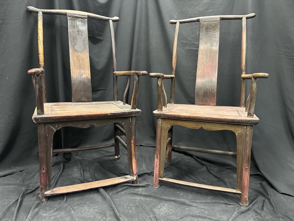 Pair of Chinese Antique High Yoke Back Armchairs 1: A pair of 19th Century wooden Antique Chinese yoke-back armchairs, also known as "official's hat chairs" due to their resemblance to the hats worn by Chinese officials during the Ming and Qing dynasti