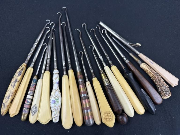 Ivorine, Porcelain & Mixed Button Hooks 18pcs: A substantial and visually engaging estate collection of 18 antique and vintage button hooks, accompanied by a French Ivory ringlet hair curler, showcasing an impressive range of materials and craftsm