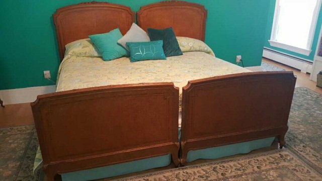 Pr. Matching Antique European Birds Eye Twin Beds: Pr. Matching Antique European Birds Eye Twin Beds featuring carved fruit wood accents and inlay. The beds measure 82" long by 44" wide by 56" tall at headboard. (the beds are currently being used toge