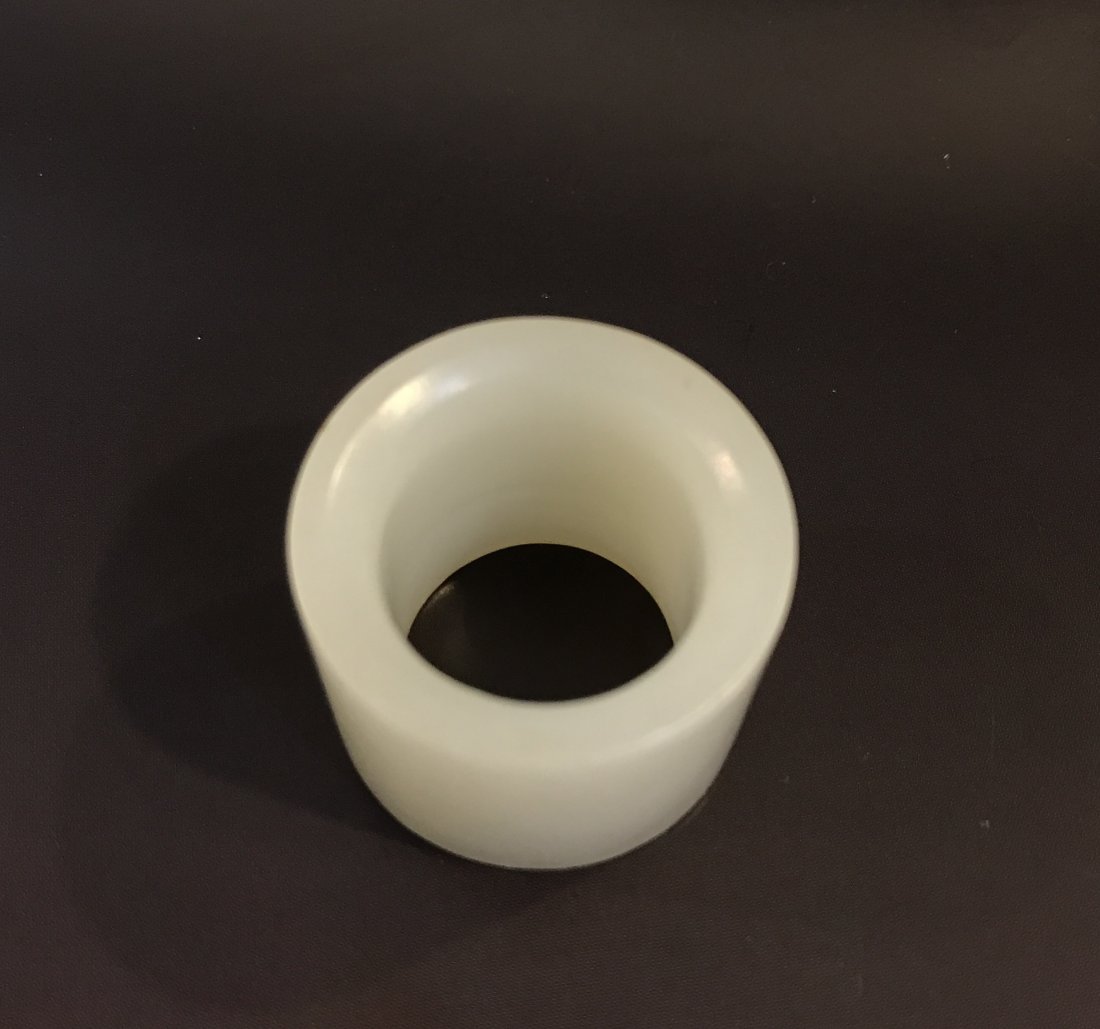 A Chinese white jade Banzhi ring (1 of 2)