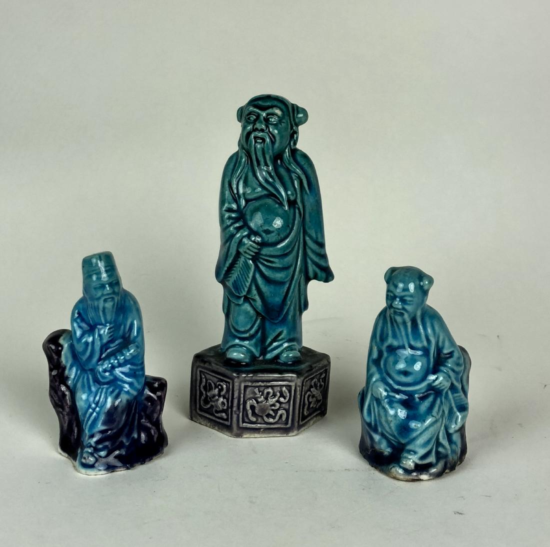 SET OF THREE BLUE GLAZED PORCELAIN FIGURES (1 of 5)