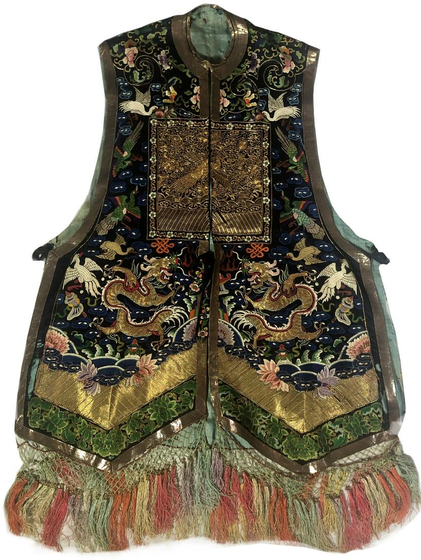 SILK EMBROIDERED DRAGON PHOENIX LADY'S VEST, XIAPEI: SILK EMBROIDERED DRAGON PHOENIX LADY'S VEST, XIAPEI. a pair of dragons on the front and a front-facing dragon on the back with flaming pearl, all amidst pairs of various birds, clouds, all surrounding