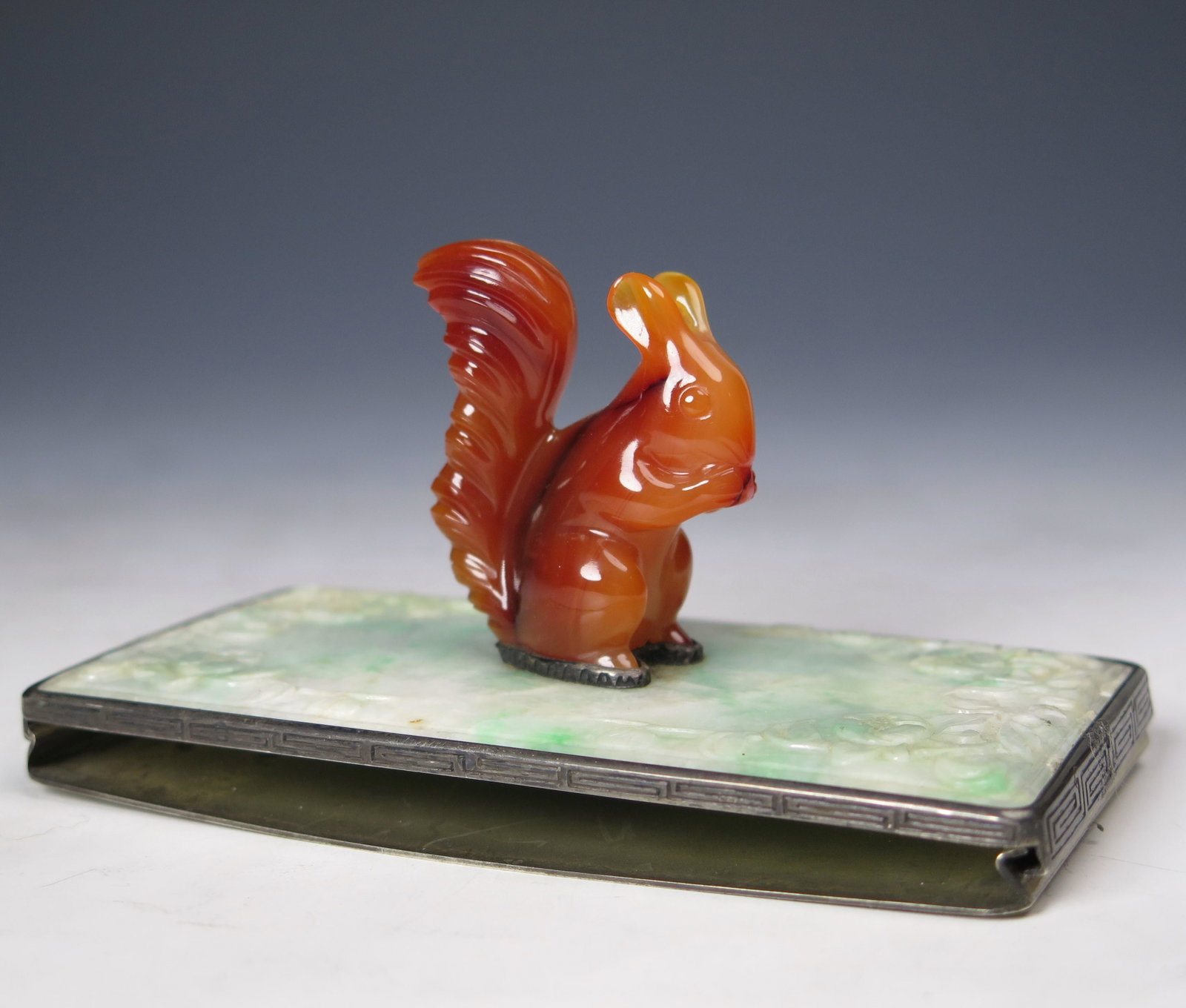 YAMANAKA & CO AGATE SQUIRREL ON JADE AND SILVER BASE: YAMANAKA & CO AGATE SQUIRREL ON JADE AND SILVER BASE, made in Japan. Dimension: 4 1/2" L x 2 3/8" W. A LIST OF RECOMMENDED THIRD-PARTY SHIPPER IS AVAILABLE UNDER SHIPPING INFORMATION. PLEASE FEEL FREE