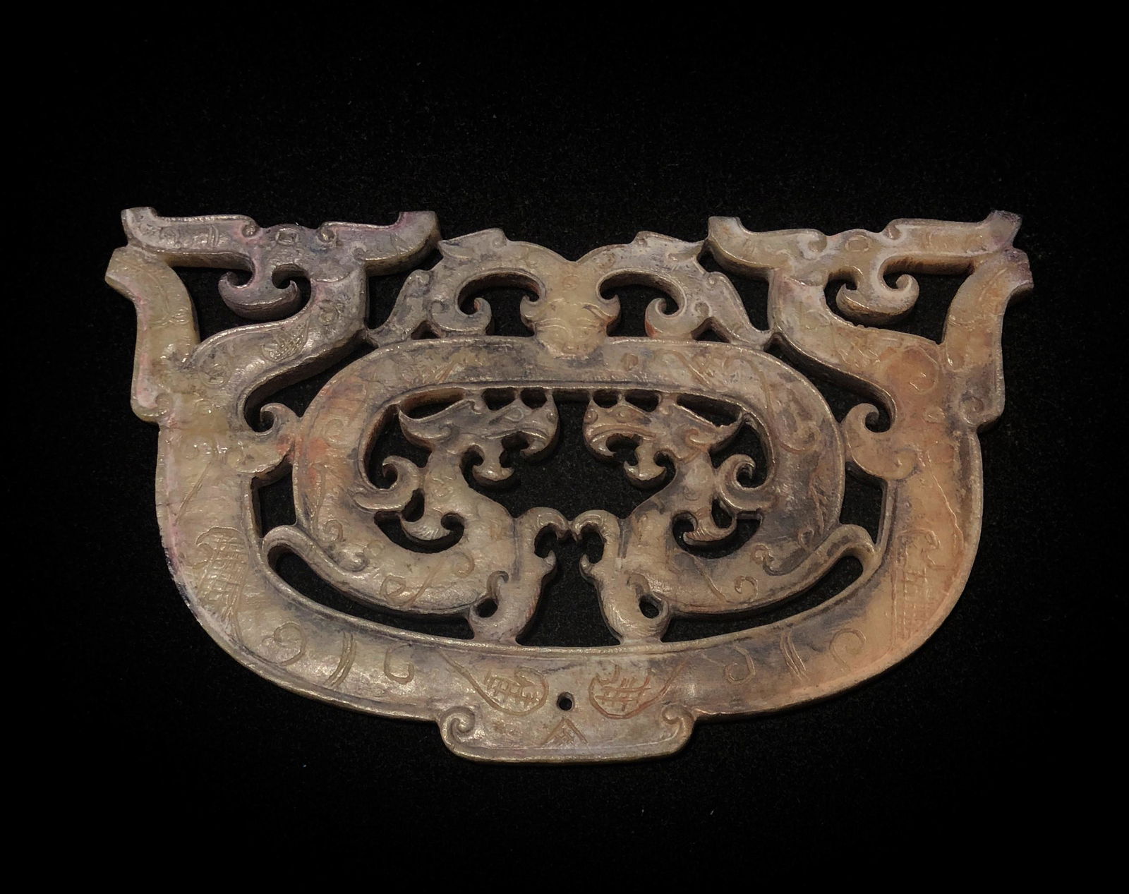 Carved And Pierced Jade Pendant: Carved And Pierced Jade Pendant Dimension: 4 1/8" x 1 5/8" (10.5 x 4.2cm). A LIST OF RECOMMENDED THIRD-PARTY SHIPPER IS AVAILABLE UNDER SHIPPING INFORMATION. PLEASE FEEL FREE TO CONTACT THEM FOR A QUO