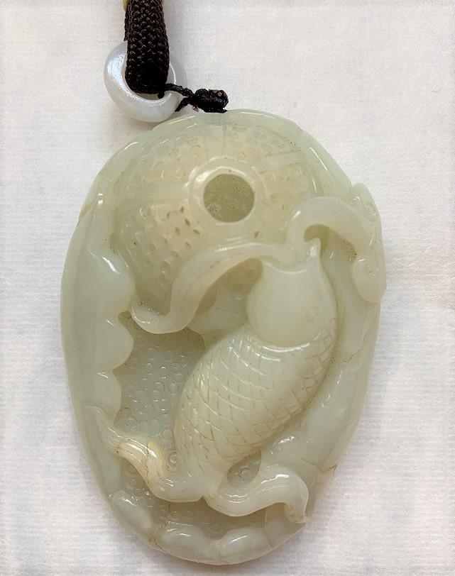 Carved And Pierced White Jade Toggle: Carved And Pierced White Jade Toggle Dimension: 3 1/4" x 2 1/8". A LIST OF RECOMMENDED THIRD-PARTY SHIPPER IS AVAILABLE UNDER SHIPPING INFORMATION. PLEASE FEEL FREE TO CONTACT THEM FOR A QUOTE.