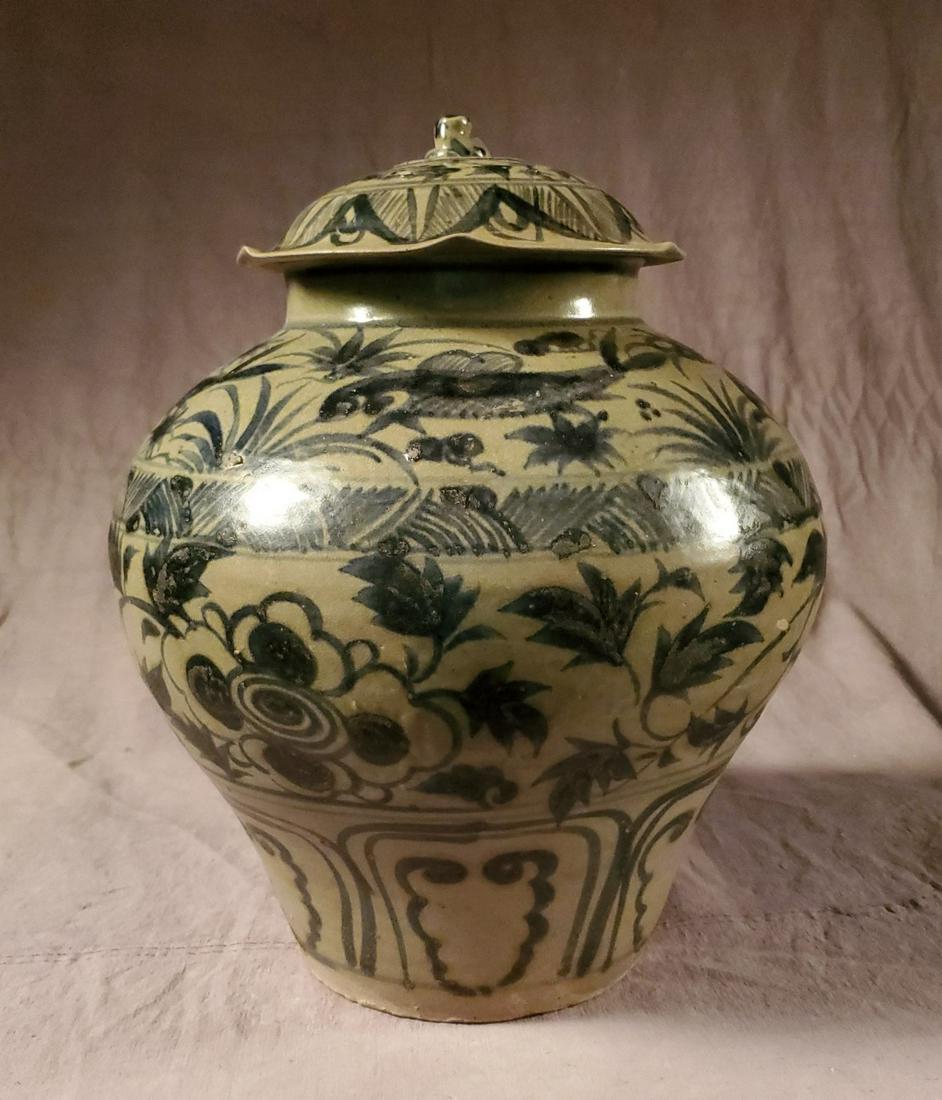 Ming Dynasty Underglaze Blue Lidded Vessel: Ming Dynasty Underglaze Blue Lidded Vessel. Potted in the southwest of China near the Vietnamese border. Fish, flora and pattern designs. Ming Dynasty c. 1368-1644 CE Dimension: 15" high A LIST OF REC