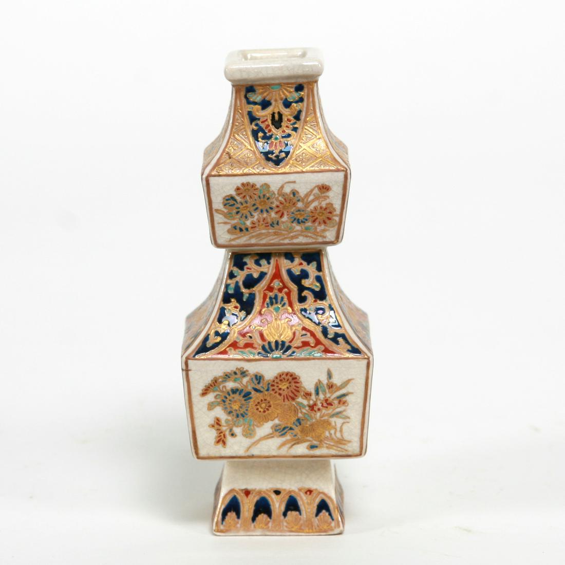 A Rare Imperial Satsuma vase, Meiji period: A Rare Imperial Satsuma vase, Meiji period. This rare creative shape displays the early classic pallete of Gossu blue, gold and other enamels, Signed in gold with blue Satsuma crest of the Lord of Shi