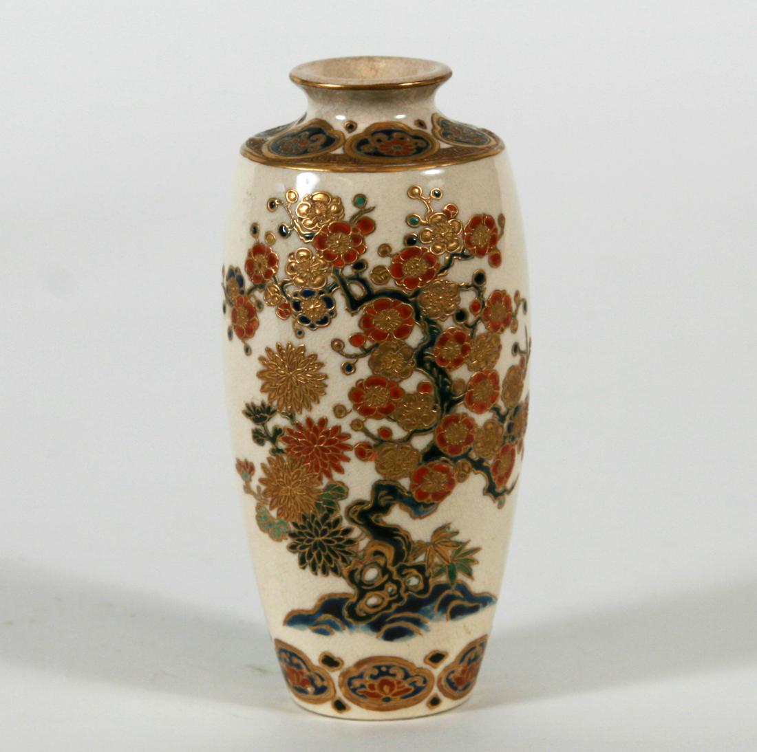 Fine Imperial Satsuma Vase, Meiji Period: Fine Imperial Satsuma Vase, Meiji Period. Beautifully applied Gossu blue, gilt and colored enamels form a tree and floral design all around. There is the artist's signature and the blue Satsuma crest 