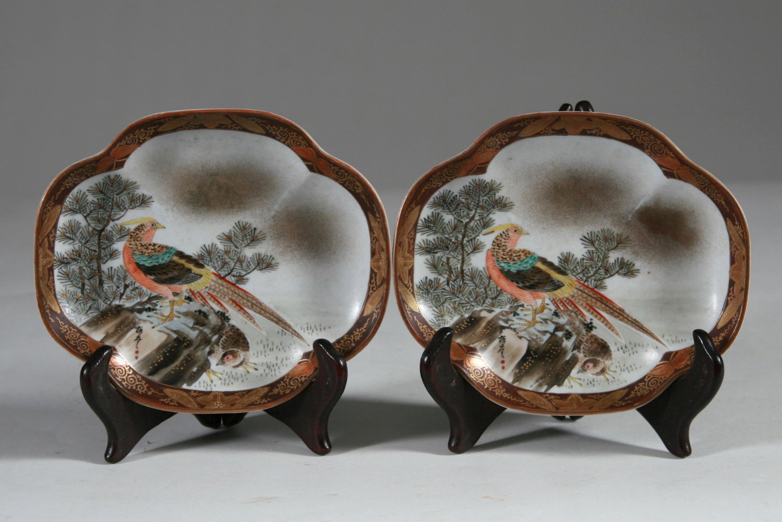 Meiji Period Two Superb Japanese Kutani Shallow Bowls: Two Superb Japanese Kutani Shallow Bowls. Two very unusual and finely drawn porcelain bowls with excellent enameling and gilding. Dimension: 6 1/4" long x 5 1/2" wide. A LIST OF RECOMMENDED THIRD-PART