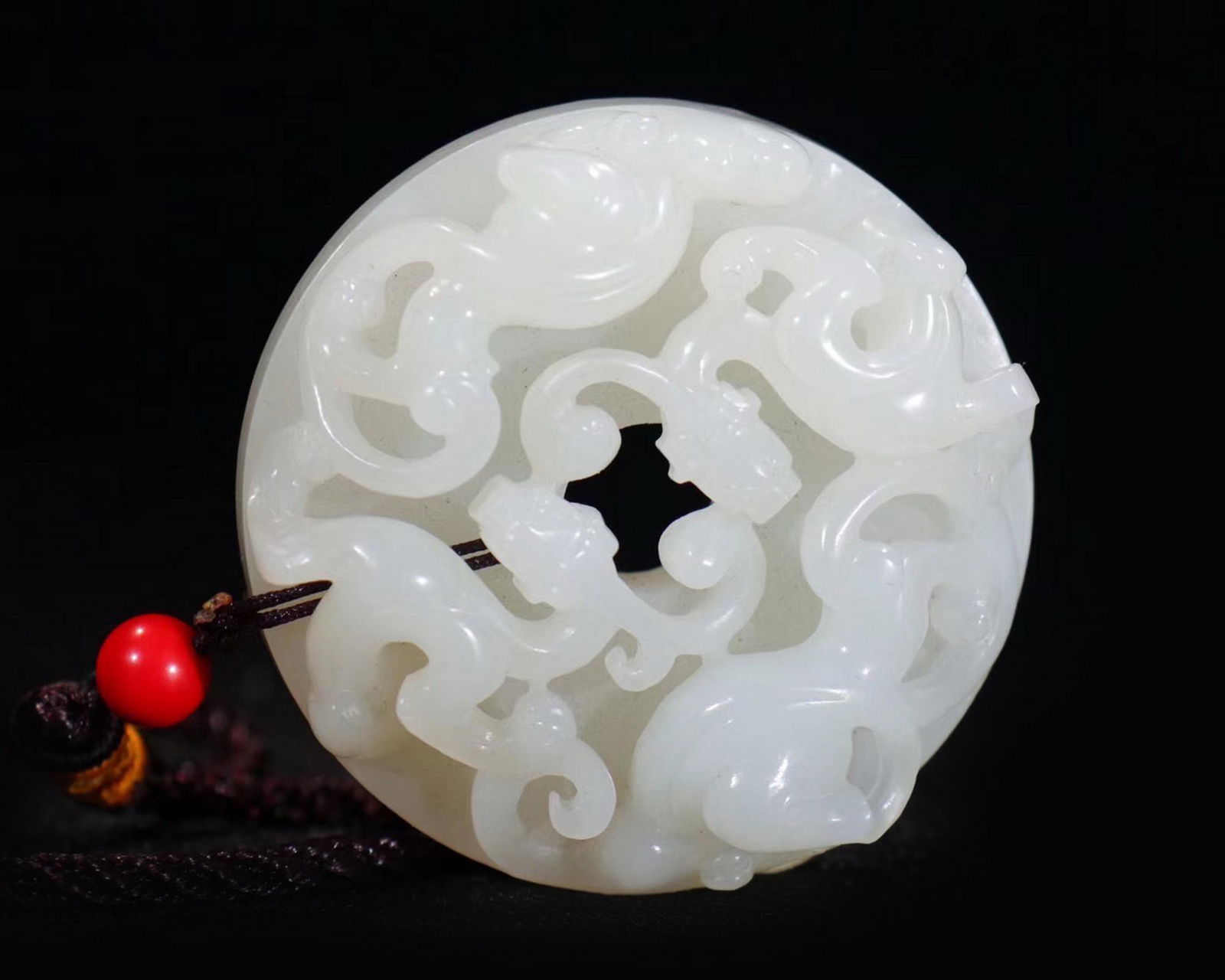 Finely Carved & Pierced Hetian White Jade Pendant: Finely Carved & Pierced Hetian White Jade Pendant Dimension: 2 3/16" (5.58 cm) Diameter. A LIST OF RECOMMENDED THIRD-PARTY SHIPPER IS AVAILABLE UNDER SHIPPING INFORMATION. PLEASE FEEL FREE TO CONTACT