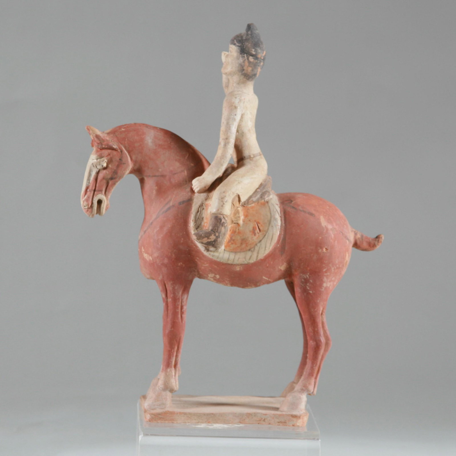 Noble Equestrian, Tang Dynasty (of the period): Noble Equestrian, Tang Dynasty (of the period) c. 650 AD. Rider on red pigmented horse standing four square with open mouth. Early Tang Dynasty. Very good condition, only restored breaks to legs of ho