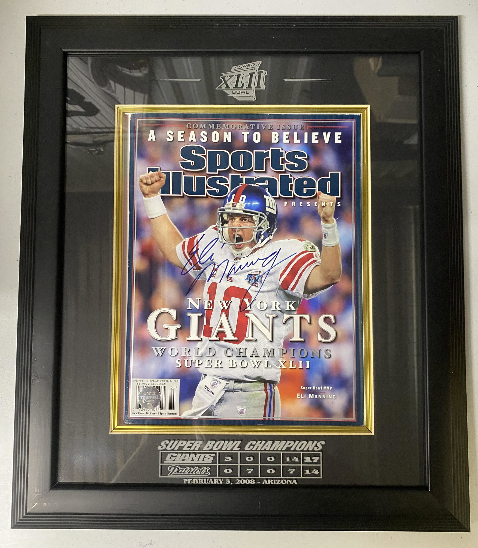 Eli Manning Autographed Sports Illustrated (1 of 3)