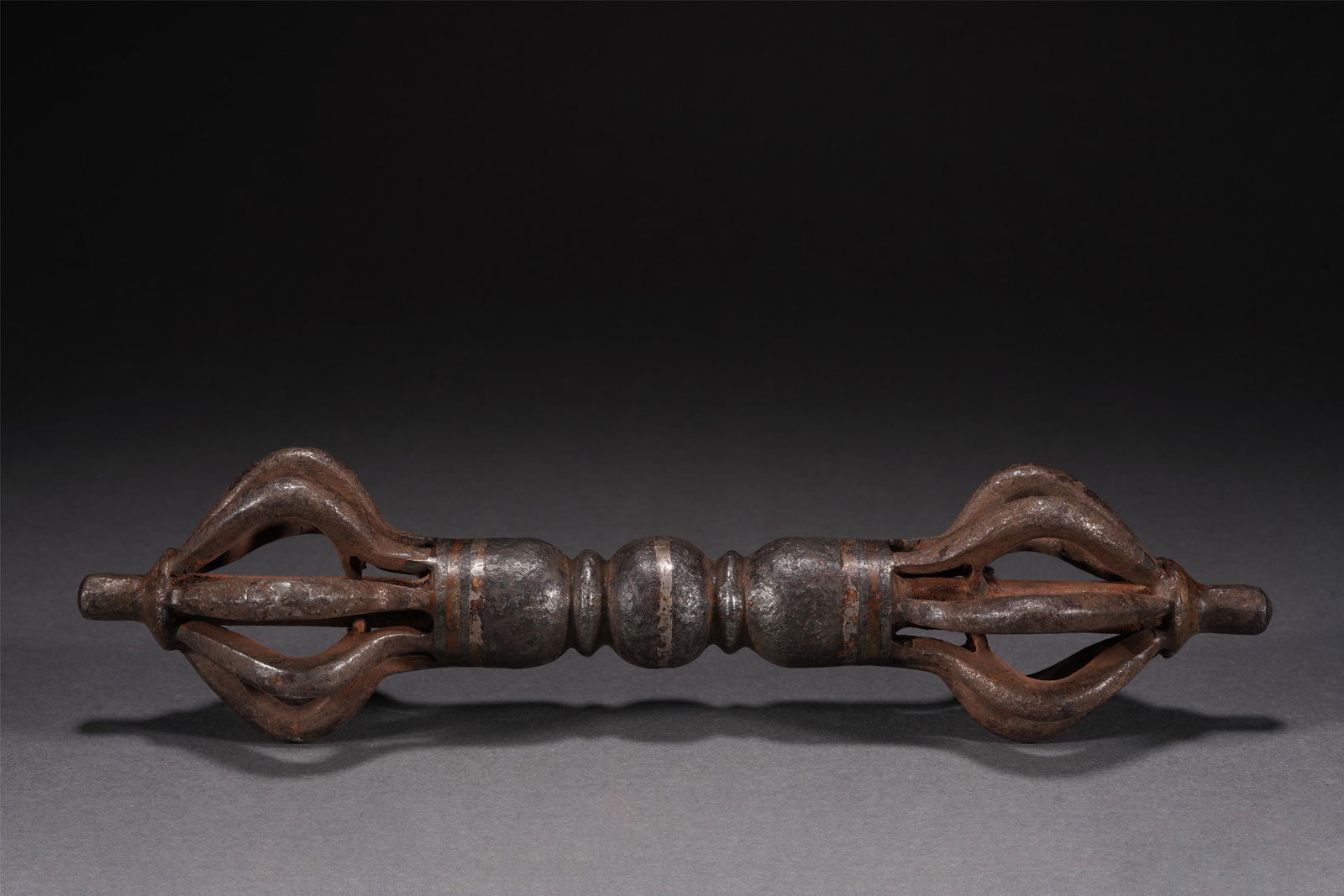 A TIBETAN SILVER DECORATED IRON VAJRA (1 of 9)