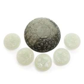 GROUP OF FINELY CARVED JADE BUTTONS