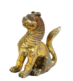 A BRONZE-GILT MYTHICAL BEAST