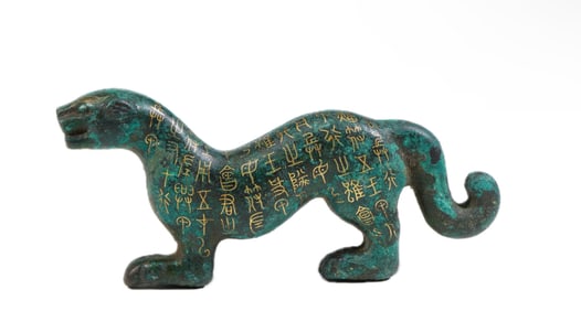 A BRONZE TIGER FINIAL