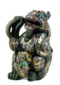 A GOLD AND SILVER INLAID MYTHICAL BEAST