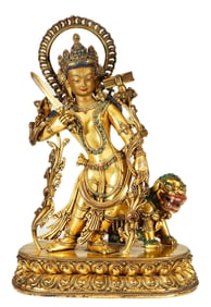 A SINO-TIBETAN BRONZE-GILT MANJUSRI