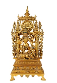 A GILT BRONZE FIGURE OF DURGA MAHISHASURAMARDINI