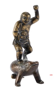 A BRONZE STANDING LIUHAI WITH GOLDEN TOAD