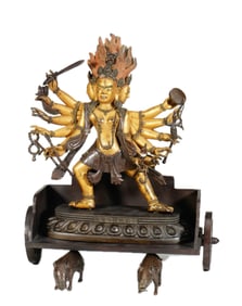 A BRONZE SINO-TIBETAN STANDING PROTECTOR