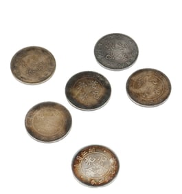 A GROUP OF SIX SILVER COINS