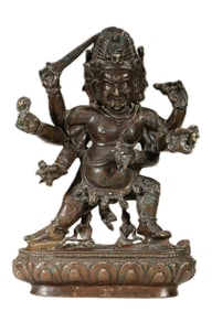 A SILVER-INLAID BRONZE FIGURE OF A PROTECTOR DEITY
