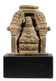 A GANDHARA CARVED GREEN SCHIST SEATED BUDDHA
