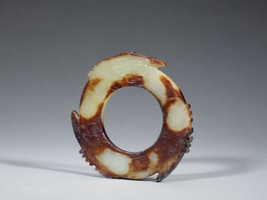 A CARVED JADE DISC YABI