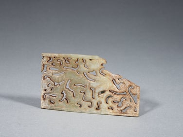 A RETICULATED JADE PLAQUE