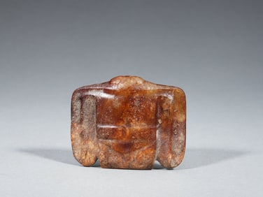 A VERY RARE RUSSET JADE BIRD-SHAPED PENDANT HONGSHAN CULTURE