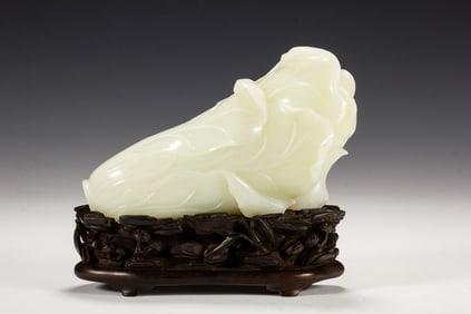 A CARVED WHITE JADE CABBAGE PAK CHOI