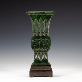 A CARVED JADE BEAKER VASE GU