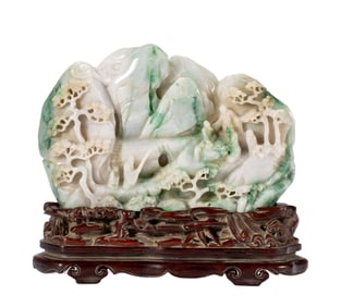 A CARVED JADEITE DECORATION