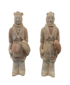 A PAIR POTTERY FIGURES
