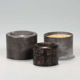 CARVED WOOD ARCHERS RING IN PEWTER BOX