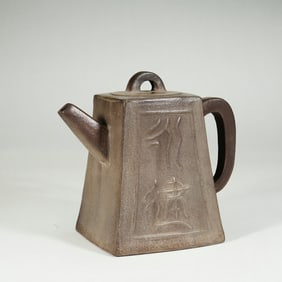 A YIXING GLAZE ZISHA TEAPOT