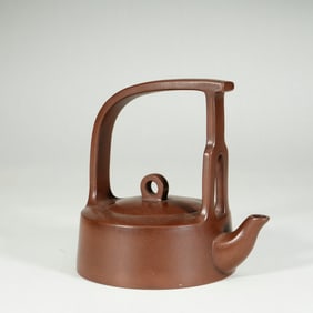 A YIXING GLAZE ZISHA TEAPOT