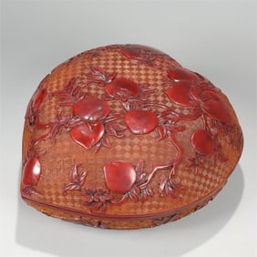 A FINELY CARVED RED LACQUER BOX AND COVER