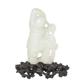 FINE CHINESE WHITE JADE FIGURE OF A BOY