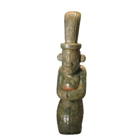 A JADE CARVING OF MYTHICAL FIGURE