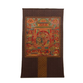 A TIBETAN EMBROIDERED THANGKA OF GOD OF WEALTH