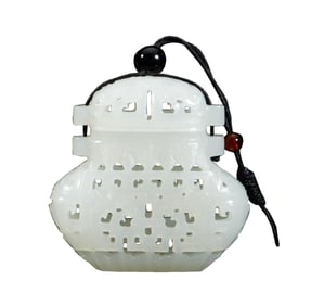 A CARVED AND RETICULATED JADE POMANDER CASE WITH COVER