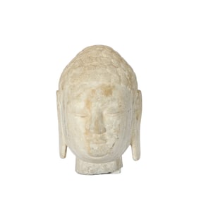 A CARVED STONG BUDDHA HEAD