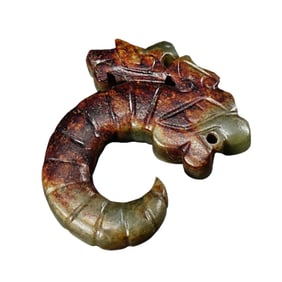 A JADE CARVING OF DRAGON