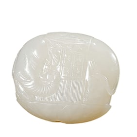 A CARVED WHITE JADE ELEPHANT