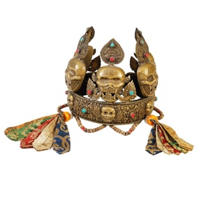 A TIBETAN HARDSTONES DECORATED BRONZE HELMET