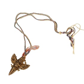 A RARE TIBETAN BRONZE HAYAGRIVA AMULET