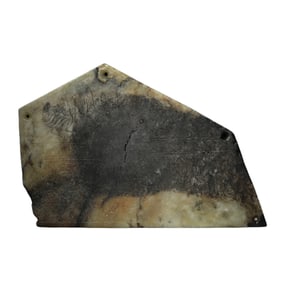 AN INCISED JADE PLAQUE