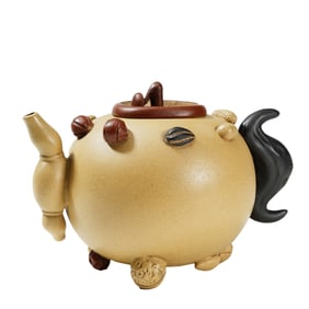 A YIXING GLAZE ZISHA NUT FRUITS TEAPOT